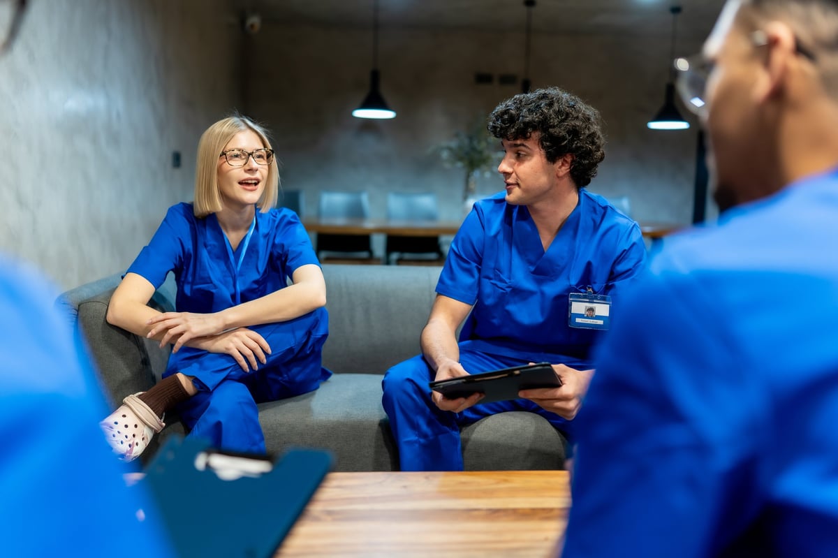 A healthcare team collaborating and discussing patient care together