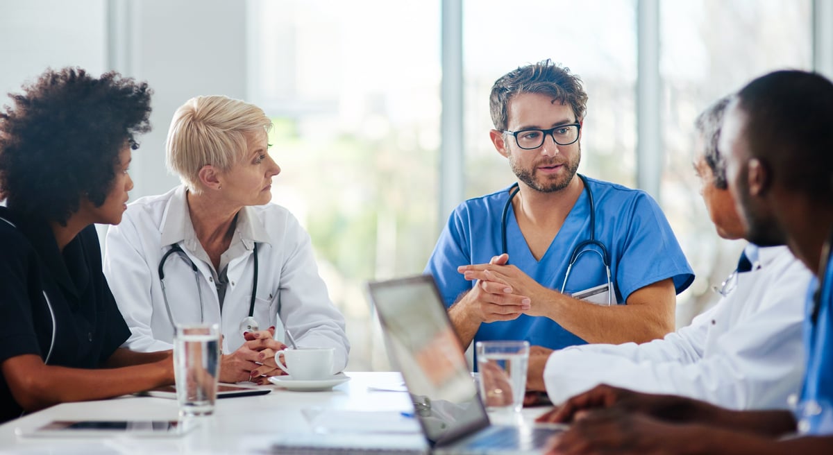 A clinical team collaborating, representing the dependable support KidneyCare provides